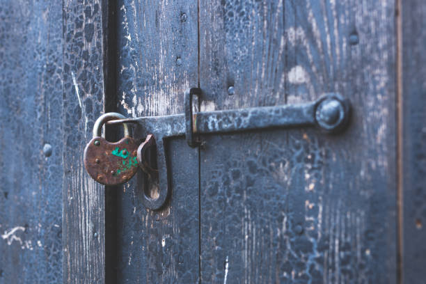 istock Padlock, Locked lock, Wooden door 1408741395