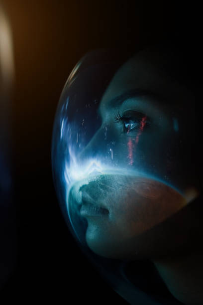 istock Female astronaut in space on planet orbit 1408745724