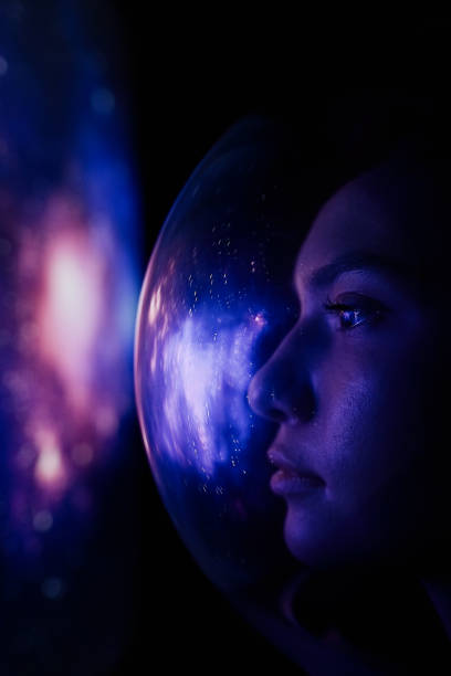 istock Female astronaut in space on planet orbit 1408745739