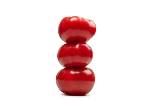 istock Red fresh tomato isolated on white background. 1408746639