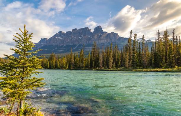 istock Sunlit Clouds Over Castle Mountain In Banff 1408748383