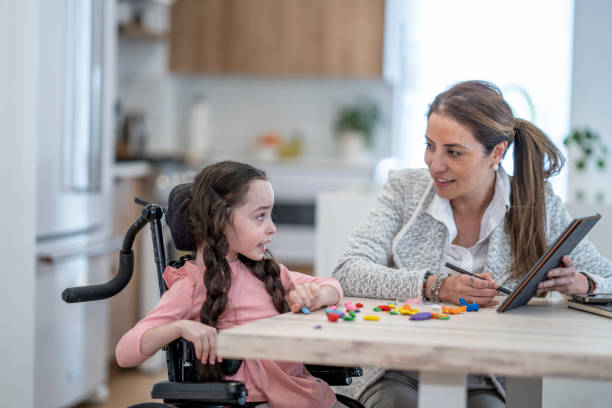 istock Therapist Working with a Cerebral Palsy Patient 1408749119