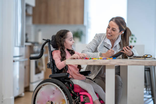 istock Therapist Working with a Cerebral Palsy Patient 1408749132