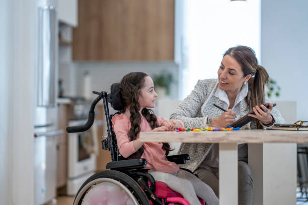 istock Therapist Working with a Cerebral Palsy Patient 1408749134