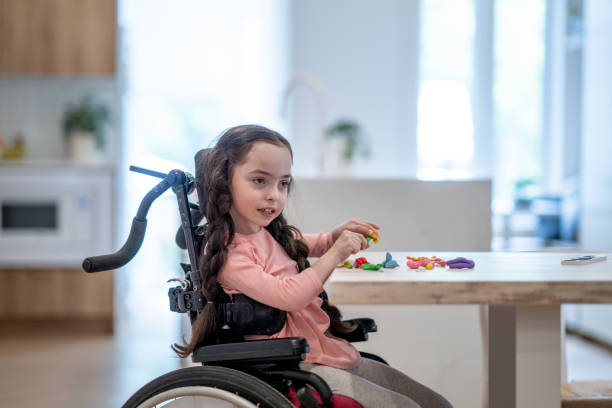 istock Little Girl with Cerebral Palsy Playing 1408749142