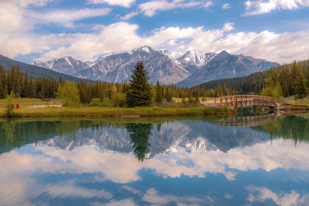 Mountains Reflecting On Cascade Ponds stock photo