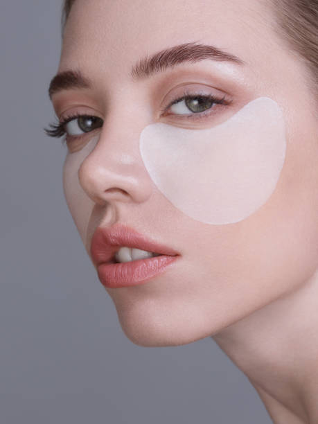 istock Beautiful woman with under-eye patches 1408750217