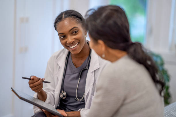 istock Homecare Nurse with a Patient 1408753890