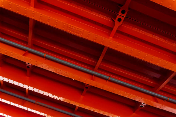 Bright orange metal base of the bridge background