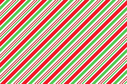 Candy cane striped pattern. Seamless Christmas background. Peppermint wrapping texture. Cute caramel package print. Xmas red green diagonal lines. Abstract geometric backdrop. Vector illustration.