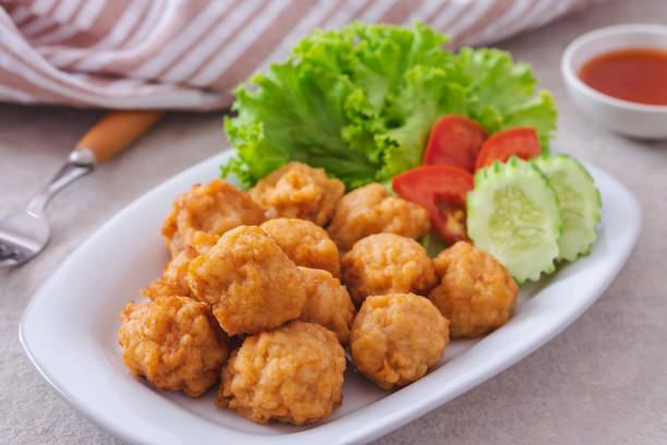istock Deep fried shrimp ball and vegetable on plate 1408773134