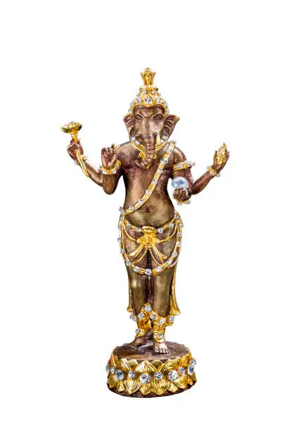 Bronze figurine of Lord ganesha ( Hindu god ) isolated on white background with clipping path. Selective focus.