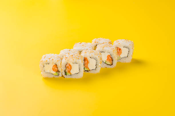 istock Alaska roll with salmon on yellow background 1408775676