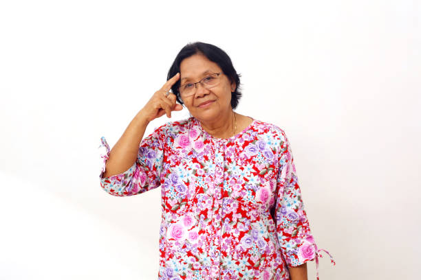 Portrait of a senior Japanese woman, white background