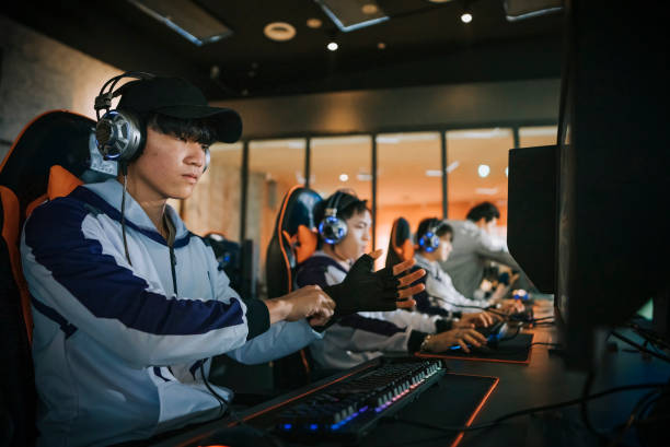 istock Asian Chinese Esports Team getting ready preparing for grand final competition in front of desktop computer 1408785129