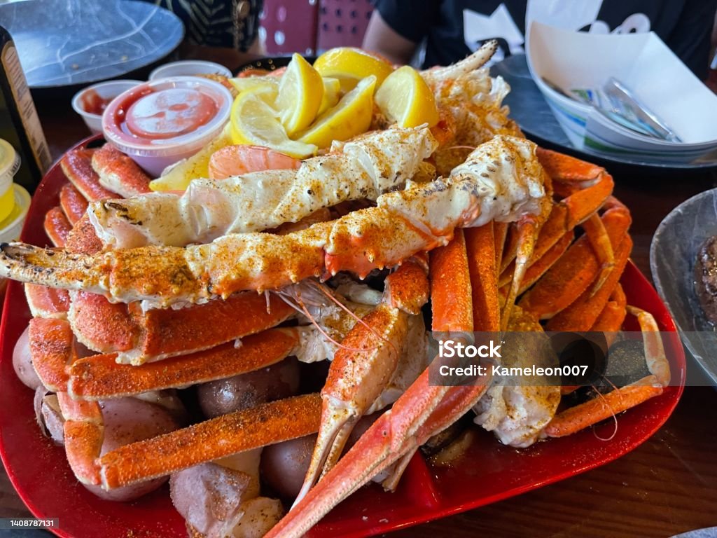 Seafood crab leg dinner Animal Body Part Stock Photo