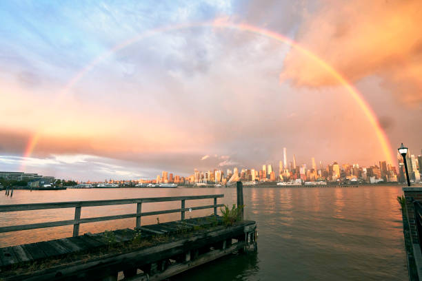 Rainbow and New York Skyline at Sunset