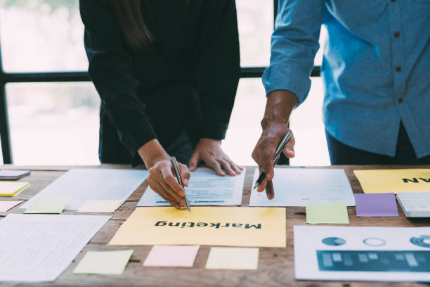 istock Business financial team work together in project brainstorm meeting. Cooperate teamwork, strategy planning, small business startup company, or office coworker concept. 1408790380