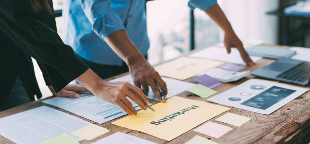 istock Business financial team work together in project brainstorm meeting. Cooperate teamwork, strategy planning, small business startup company, or office coworker concept. 1408790400