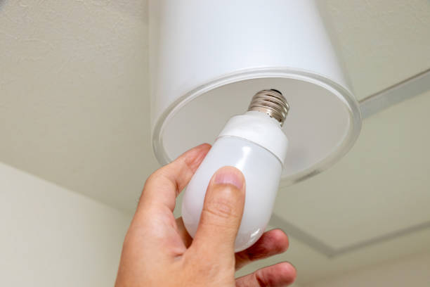 istock Replace the light bulb of the lighting fixture 1408796239