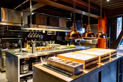 Beautiful commercial kitchen at a restaurant - food and drink establishment concepts