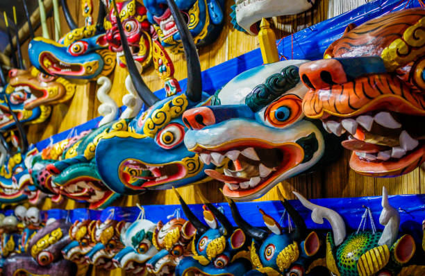 Traditional Bhutanese Mask This photo was clicked in Thimphu, Bhutan. Thimphu is the capital of Bhutan. bhutanese culture photos stock pictures, royalty-free photos & images
