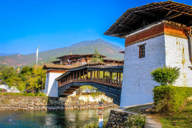 Punakha Dzong This photo was clicked in Punakha, Bhutan. It was the royal palace of Bhutan. This is a very famous tourist place in Bhutan. monastery religion spirituality river stock pictures, royalty-free photos & images