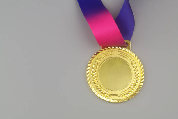 istock Gold medal on blue background 1408818167