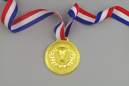 close up of gold medal