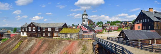 Roros mining town pano, Norway Roros historic copper mining town panorama, church and wooden houses, Trondelag, Norway, Europe roros mining city stock pictures, royalty-free photos & images