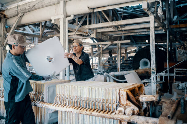 Two men working in a factory