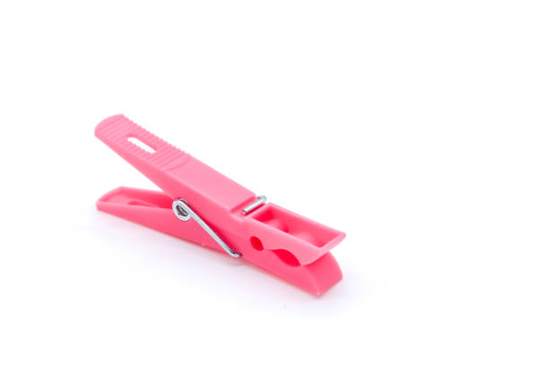 istock plastic clothespins with different colors like green, pink, blue, orange on white background 1408823781
