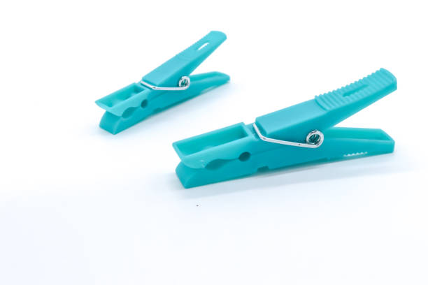 istock plastic clothespins with different colors like green, pink, blue, orange on white background 1408823821