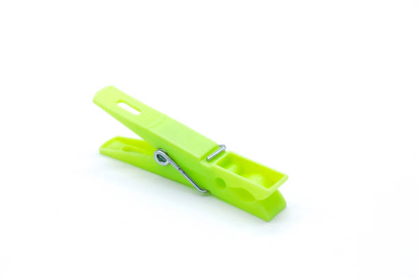 istock plastic clothespins with different colors like green, pink, blue, orange on white background 1408823856