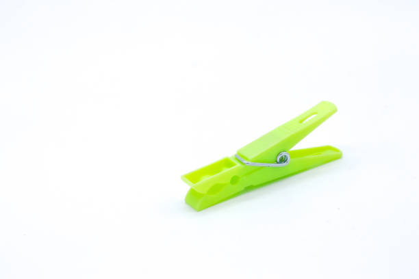 istock plastic clothespins with different colors like green, pink, blue, orange on white background 1408823890