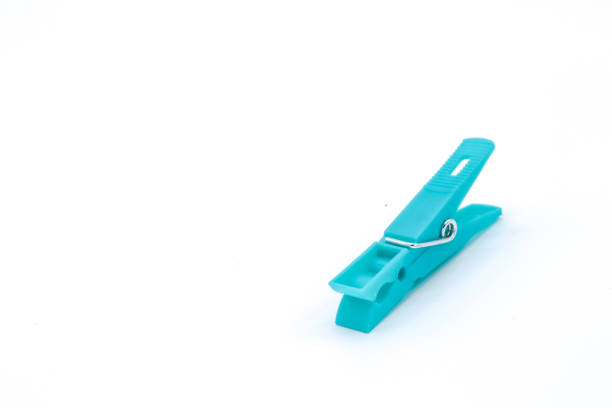 istock plastic clothespins with different colors like green, pink, blue, orange on white background 1408823892