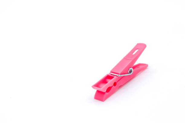 istock plastic clothespins with different colors like green, pink, blue, orange on white background 1408823910