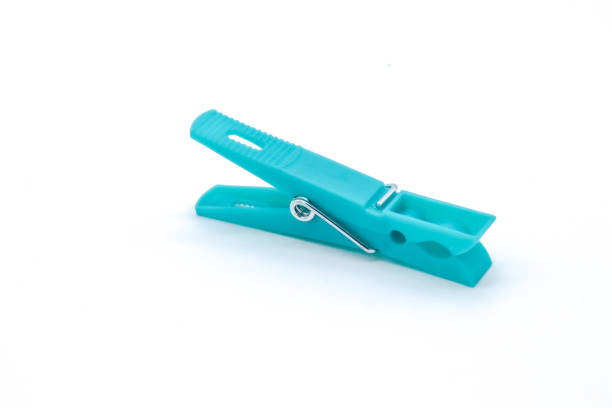 istock plastic clothespins with different colors like green, pink, blue, orange on white background 1408823937