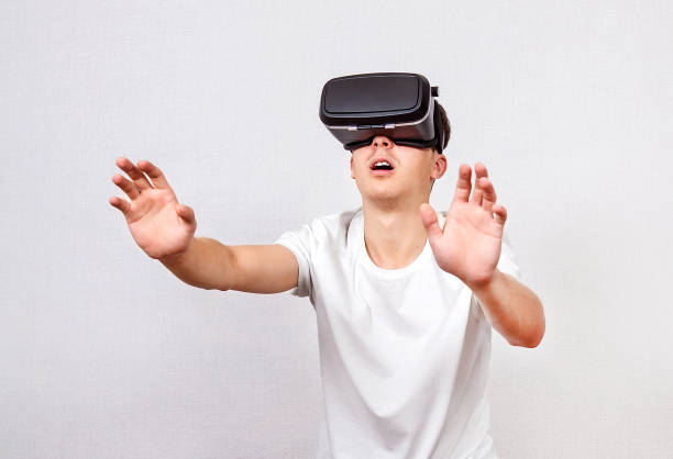 istock Young Man in VR Glasses 1408827871