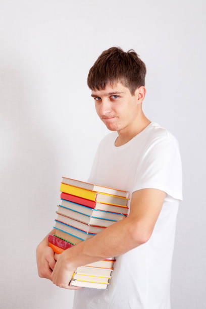 istock Displeased Student with a Books 1408827932
