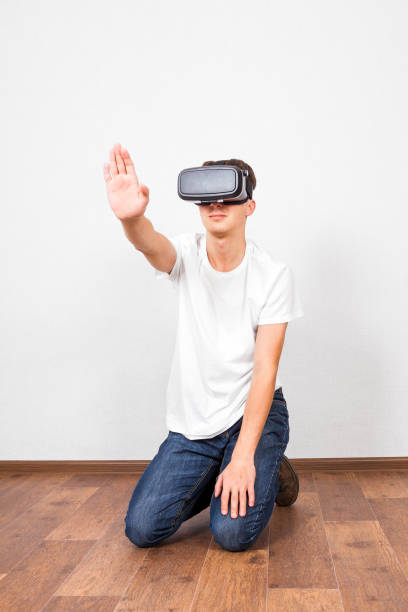 istock Young Man in VR Glasses 1408827941