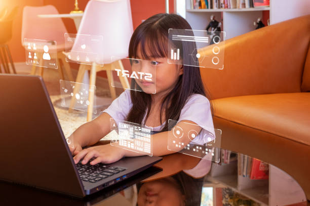 Girl typing keyboard with futuristic technology concept graphics. stock photo