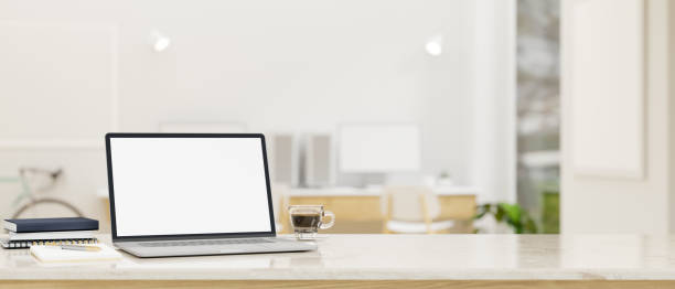istock Workspace tabletop with laptop mockup and empty space over blurred  minimal home office studio 1408832652