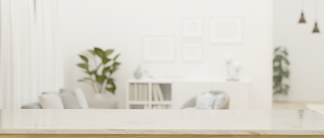 Espacio de maqueta en mesa de mármol blanco moderno sobre fondo de sala de estar blanco borroso photo