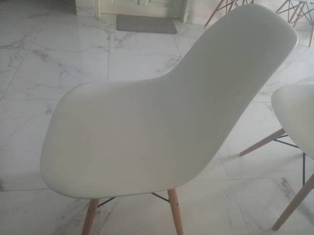 istock modern white chair on marble floor 1408833099