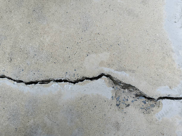 istock Cracked concrete building or floor cement wall broken at the outside effect with earthquake 1408833175