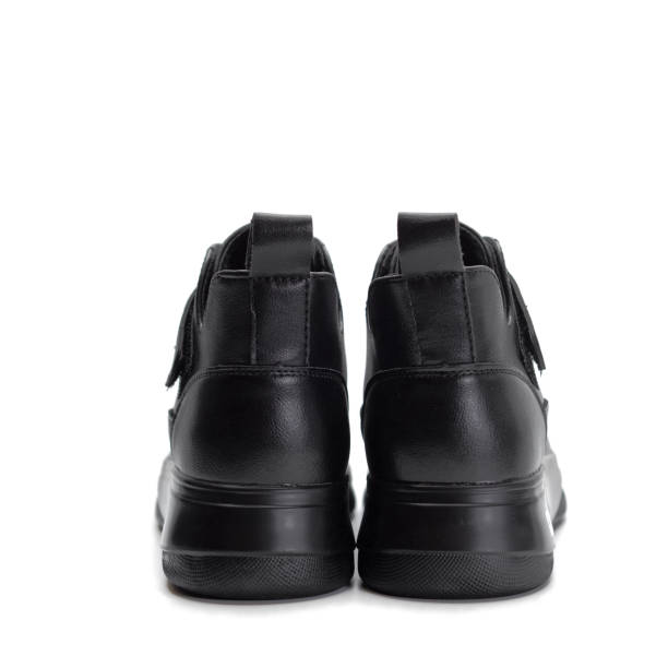 istock Black shoes on gray and white background 1408838070