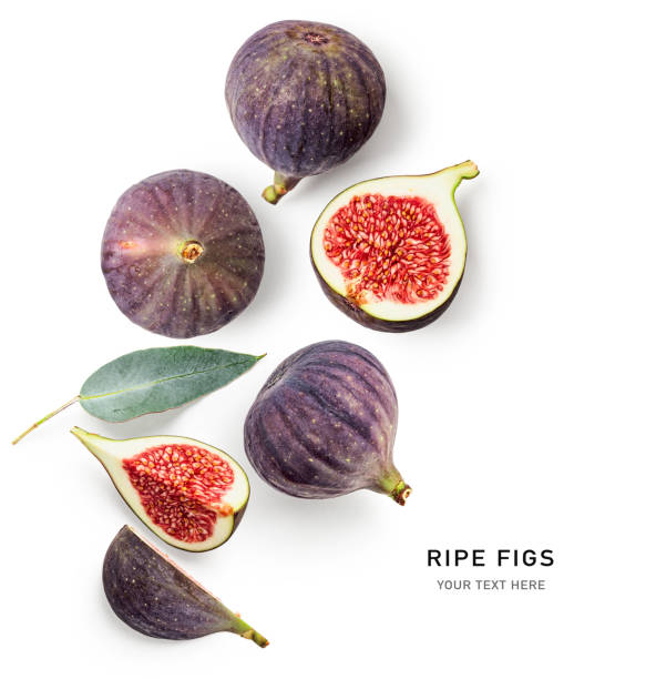 Fig fruits creative layout Fig fruit creative layout isolated on white background. Healthy eating and dieting food concept. Tropical fruits and leaves composition. Top view, flat lay. Design element fig stock pictures, royalty-free photos & images