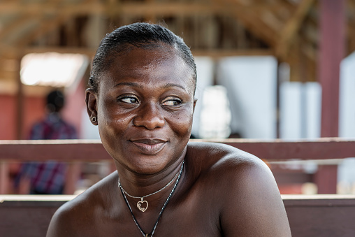 African woman enjoying her free time at a restaurant in Accra Ghana West Africa