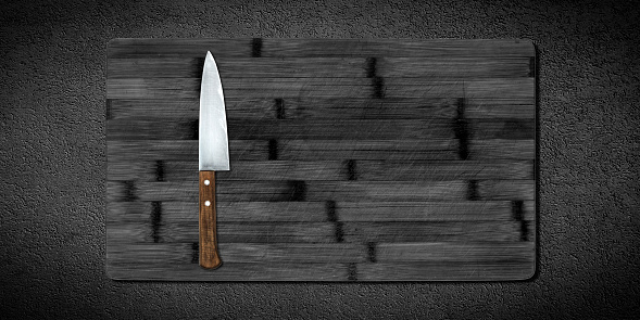 Topview of Cooking Knife and Cutting Board on Dark Background